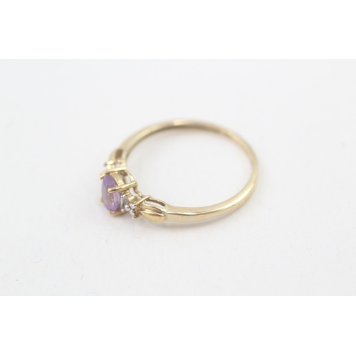 149 - 9ct gold amethyst single stone ring with diamond sides (1.8g) Size  O