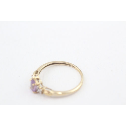 149 - 9ct gold amethyst single stone ring with diamond sides (1.8g) Size  O