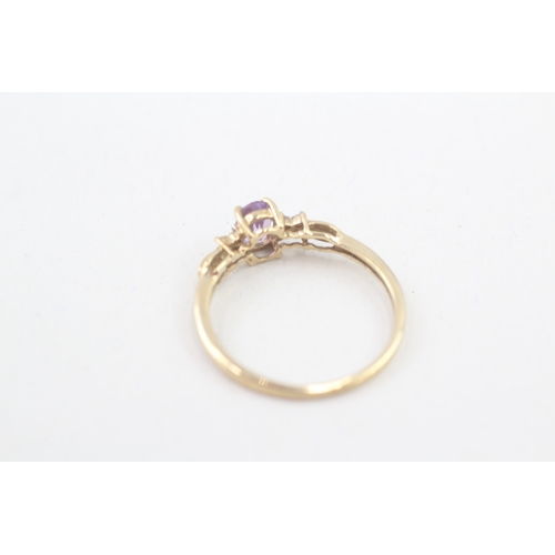 149 - 9ct gold amethyst single stone ring with diamond sides (1.8g) Size  O