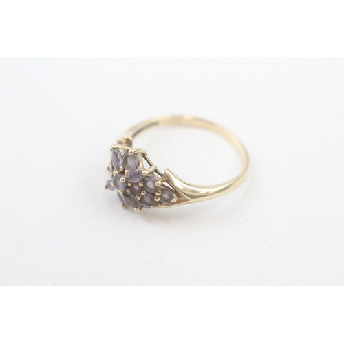 153 - 9ct gold tanzanite floral cluster ring (2.9g) Size  T