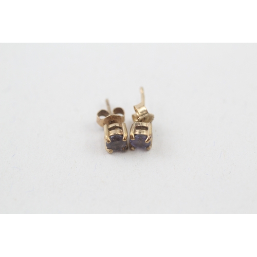 164 - 9ct gold tanzanite stud earrings (0.8g)