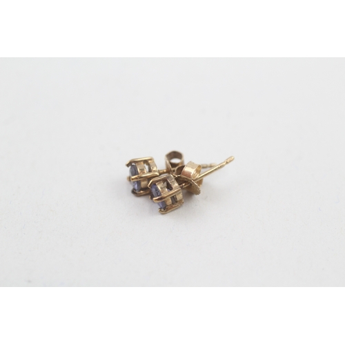 164 - 9ct gold tanzanite stud earrings (0.8g)