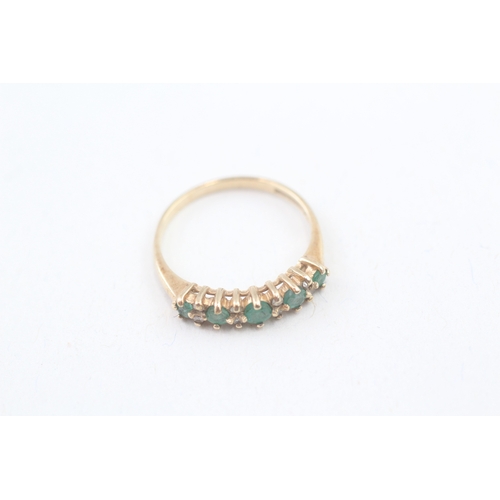 172 - 9ct gold emerald and diamond half eternity dress ring (1.5g) Size  L