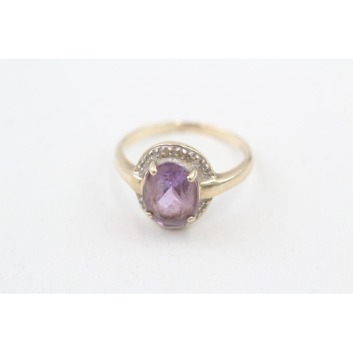 181 - 9ct gold diamond and amethyst halo dress ring (3.3g) Size  P