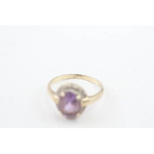 181 - 9ct gold diamond and amethyst halo dress ring (3.3g) Size  P