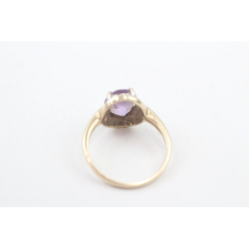 181 - 9ct gold diamond and amethyst halo dress ring (3.3g) Size  P