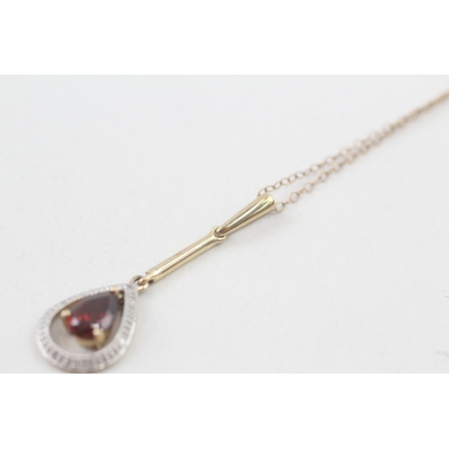 186 - 9ct gold pear cut garnet & diamond drop necklace (2.1g)