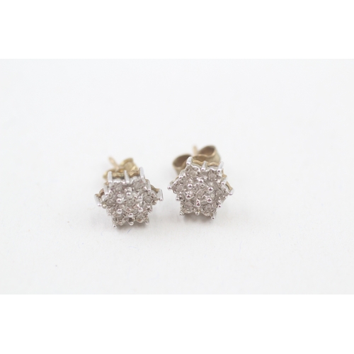 192 - 9ct gold diamond floral cluster stud earrings (1.6g)