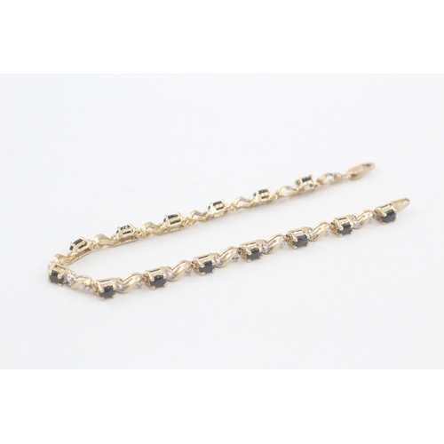 202 - 10ct gold sapphire and diamond tennis bracelet (6.2g)