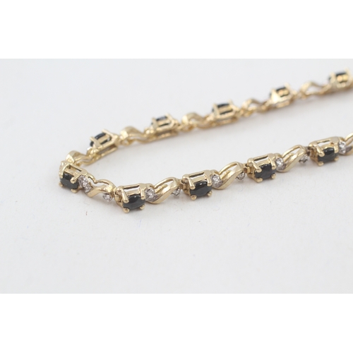 202 - 10ct gold sapphire and diamond tennis bracelet (6.2g)