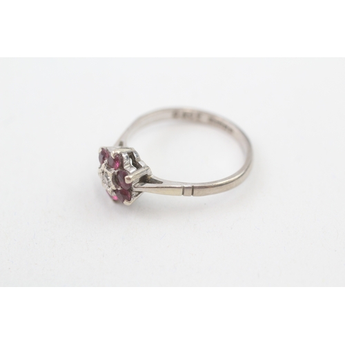 205 - 18ct gold diamond & ruby floral cluster ring (2.8g) Size  M