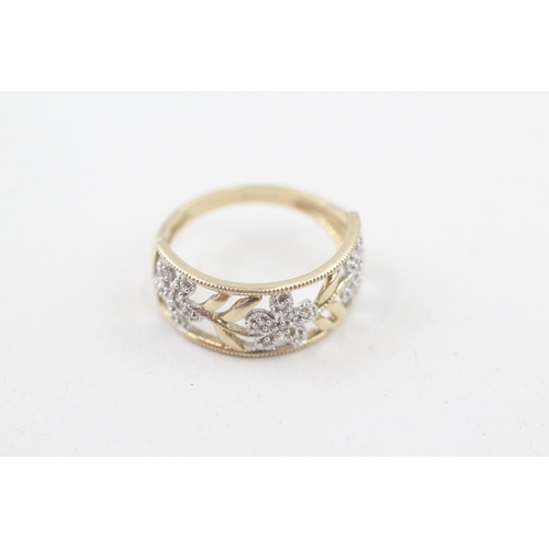 207 - 9ct white & yellow gold diamond openwork floral ring (2.5g) Size  M