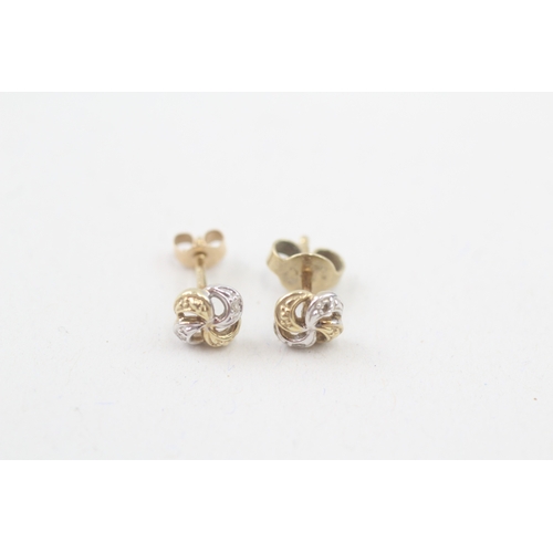 209 - 14ct gold white & yellow gold diamond stud earrings (1g)