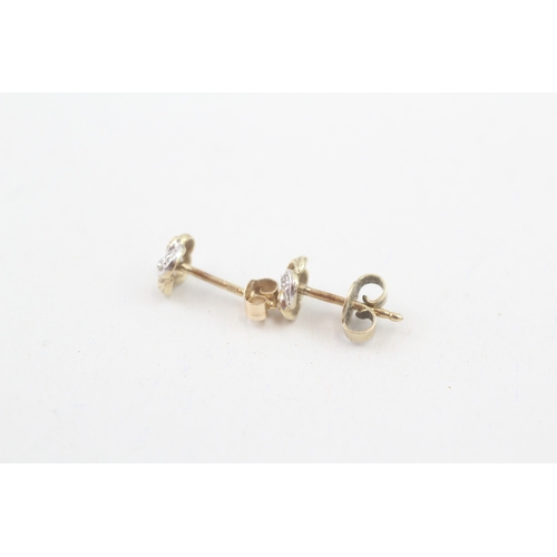 209 - 14ct gold white & yellow gold diamond stud earrings (1g)