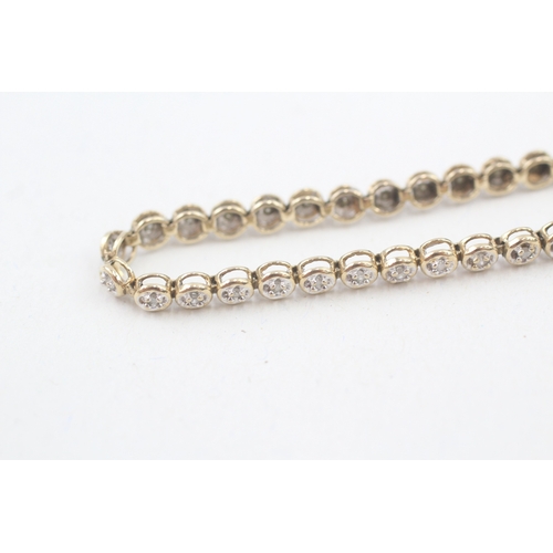 212 - 9ct gold diamond round tennis link bracelet (6.6g)