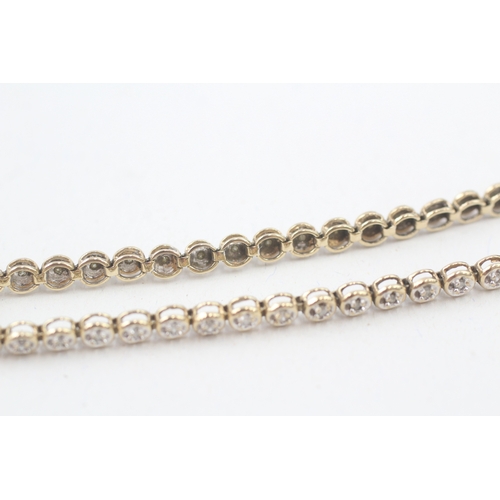 212 - 9ct gold diamond round tennis link bracelet (6.6g)