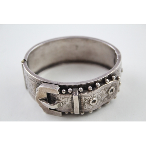 245 - Silver antique bangle with buckle detail