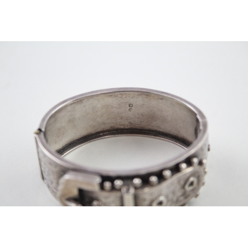 245 - Silver antique bangle with buckle detail