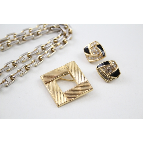 249 - A collection of gold tone designer jewellery including Givenchy, Grosse and Dior