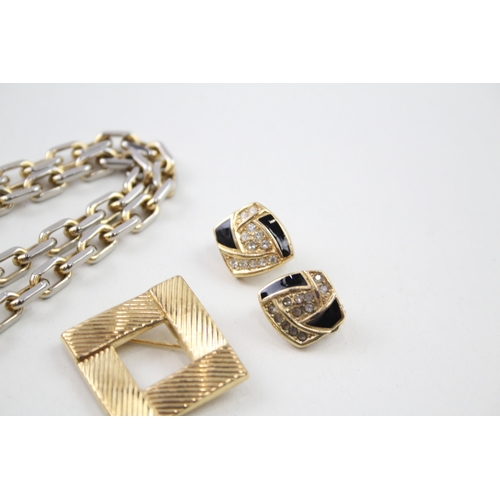 249 - A collection of gold tone designer jewellery including Givenchy, Grosse and Dior