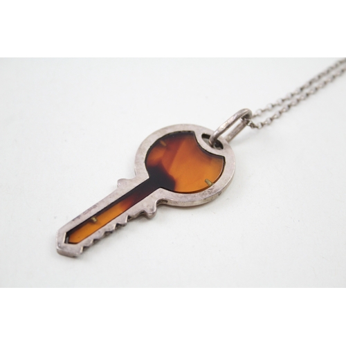 254 - Silver key pendant set with Amber on chain