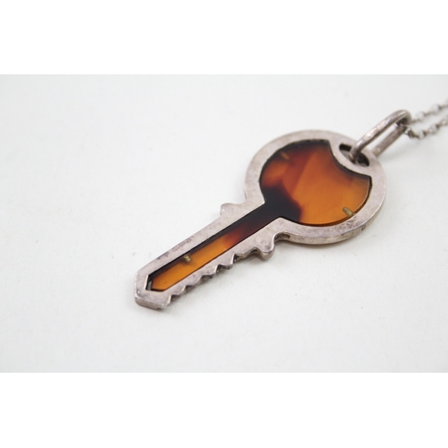 254 - Silver key pendant set with Amber on chain