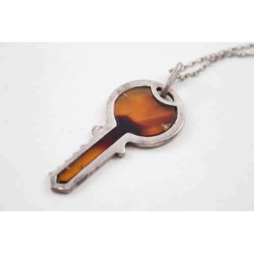 254 - Silver key pendant set with Amber on chain