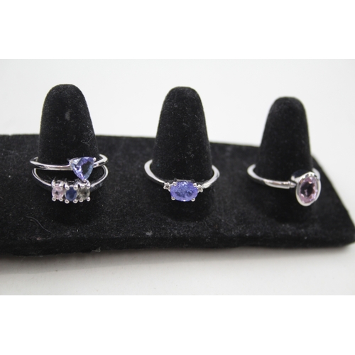 266 - A collection of silver gemstone rings including Diamond