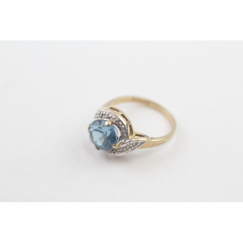 27 - 9ct gold blue topaz & diamond dress ring (2.3g) Size  I 1/2