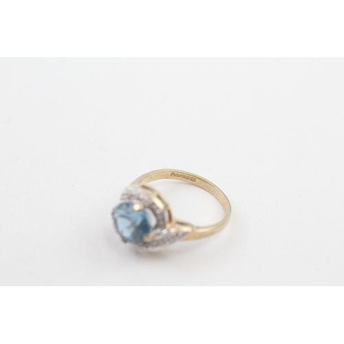 27 - 9ct gold blue topaz & diamond dress ring (2.3g) Size  I 1/2