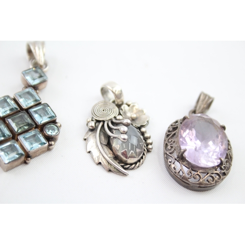 272 - Four silver gemstone pendants including Amethyst