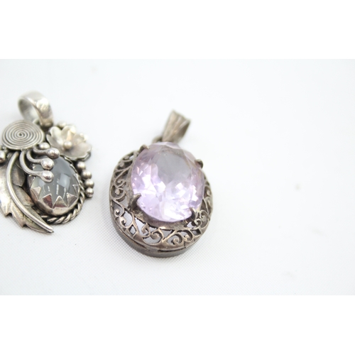 272 - Four silver gemstone pendants including Amethyst