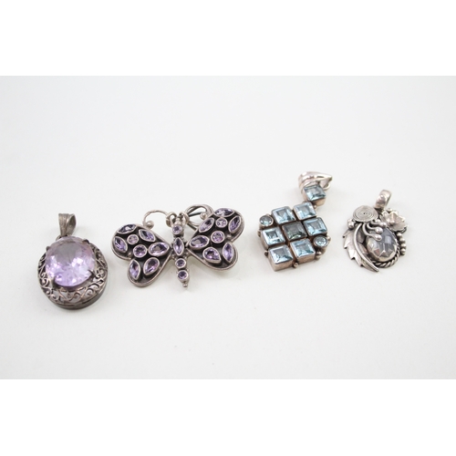 272 - Four silver gemstone pendants including Amethyst