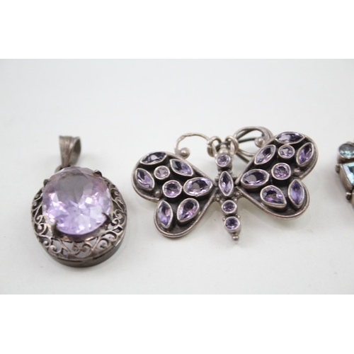 272 - Four silver gemstone pendants including Amethyst