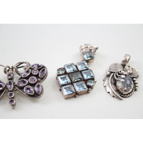 272 - Four silver gemstone pendants including Amethyst