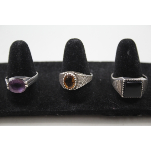 280 - Four silver mid-century rings including gemstone