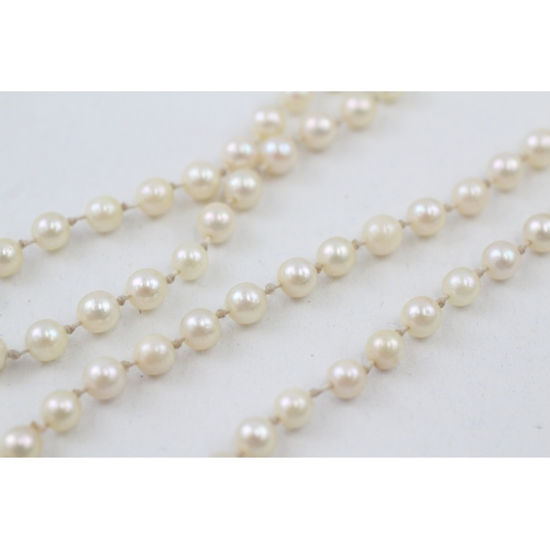 38 - 9ct gold diamond set clasp cultured pearl necklace (11.8g)