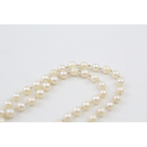 38 - 9ct gold diamond set clasp cultured pearl necklace (11.8g)