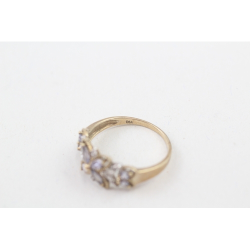 39 - 9ct gold tanzanite and diamond floral dress ring (2.2g) Size  P