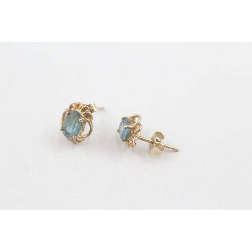 48 - 9ct gold blue topaz stud earrings (1g)