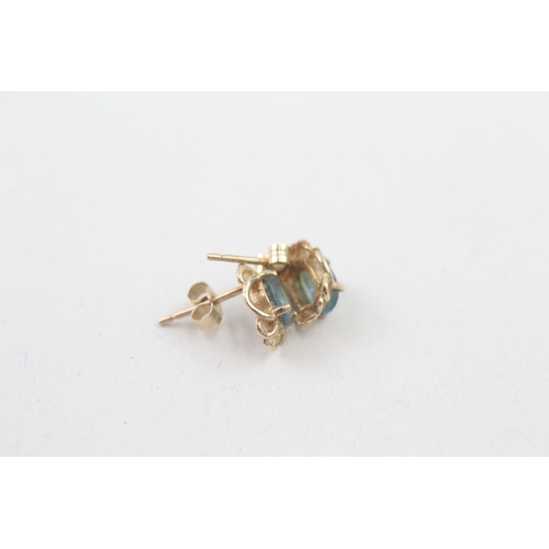 48 - 9ct gold blue topaz stud earrings (1g)