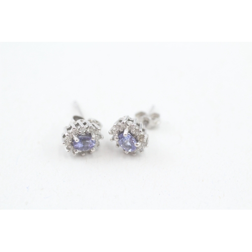 5 - 9ct white gold tanzanite and diamond halo stud earrings (1.2g)