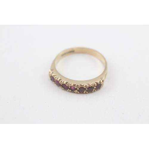 64 - 9ct gold vintage ruby half eternity dress ring (2.8g) Size  P