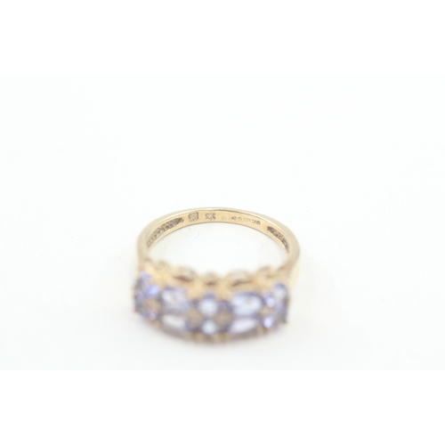 76 - 9ct gold tanzanite and diamond multi row dress ring (2.9g) Size  N