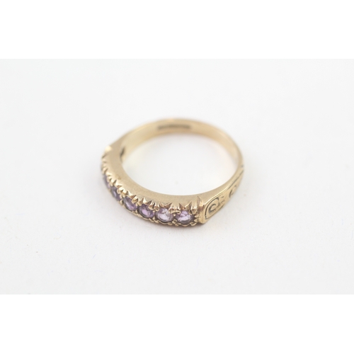 78 - 9ct gold vintage amethyst half eternity ring with patterned shoulders (2.9g) Size  P