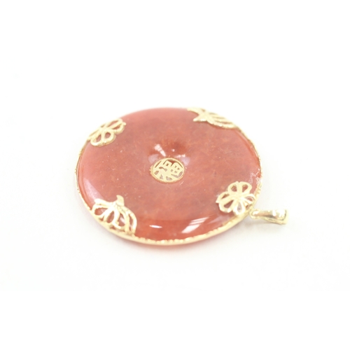 84 - 14ct gold jade pendant with oriental design (14g)