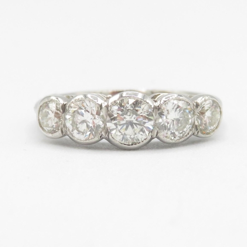 1 - Platinum Five Stone Diamond Ring - Graduated rub-over with five brilliant cut natural earth mined di... 