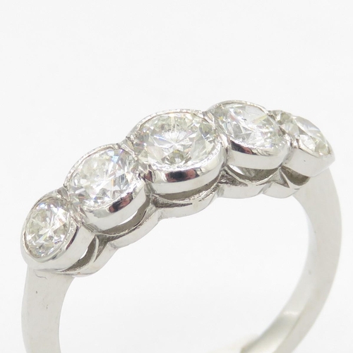 1 - Platinum Five Stone Diamond Ring - Graduated rub-over with five brilliant cut natural earth mined di... 