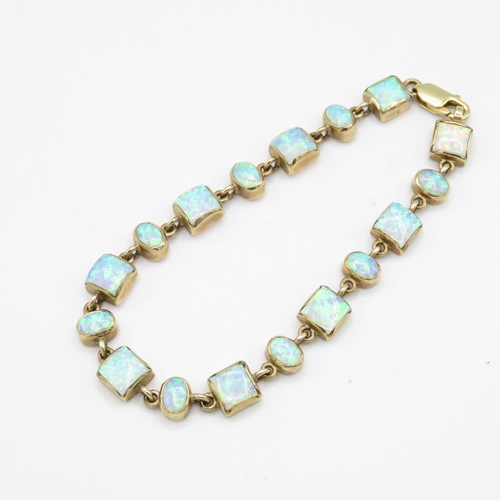 239 - 9ct gold opal triplet bracelet 11.7g - 19cm