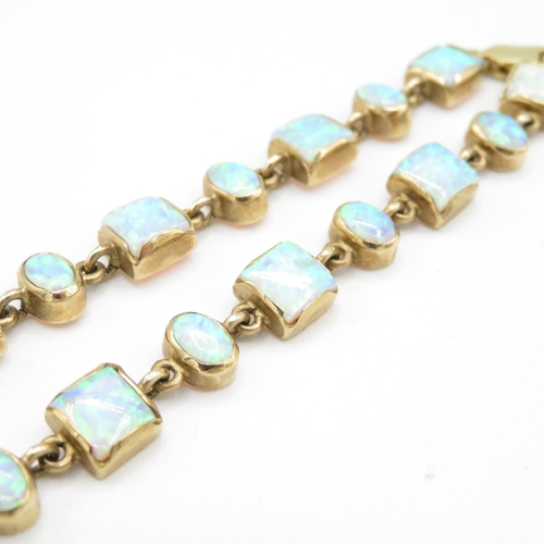 239 - 9ct gold opal triplet bracelet 11.7g - 19cm